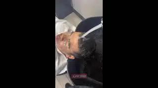 Barber pranks customer with water