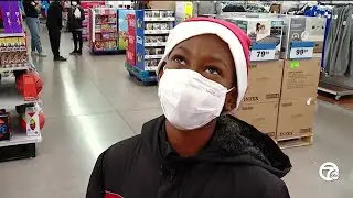 Lions take kids from Downtown Boxing Gym shopping for holidays