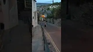 Jess walking up the hill at Robin Hoods Bay