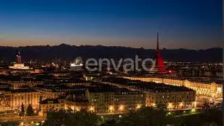 Turin time lapse, Torino time lapse panoramic cityscape fading from sunset to night. | Stock Foo...