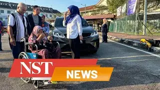 Elderly couple touched as MB Onn Hafiz chauffeurs them to vote