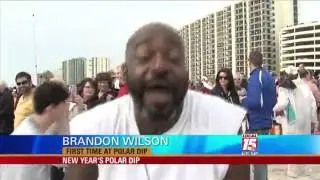 Hundreds Brave Icy Waters for Polar Bear Dip