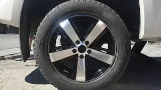 Roda Amarok aro 19 colocando no carro.
