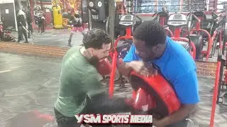 Joshafat Ortiz punishes the Punching shield with Greg Hackett