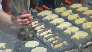 Japanese street food made with great skill. Classic delicious Japanese sweets. Taiyaki.