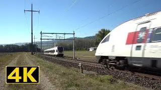 Busy train track from Geneva to Lausanne Switzerland