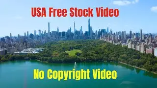 A sunny day aerial view of Central Park Lake, New York, USA. No Copyright Video.USA free stock video