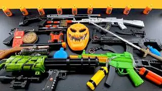 Ultimate Toy Gun Arsenal Unboxing! M249 Gatling Gun, AK-47, Sniper Rifle, Shotguns & Pumpkin Mask