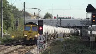 Freightliner 66606 Cement Train passing Ealing Broadway