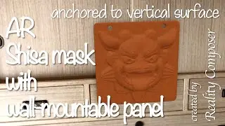 AR Shisa mask with wall-mountable panel