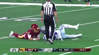 Randy Gregory lays next to Taylor Heinicke after hit