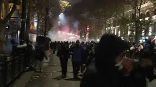 Protesters in Georgia shoot fireworks as riot police create barricade | AFP