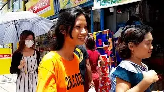 Burmese Dream shows the streets of Hledan Center Yangon Myanmar