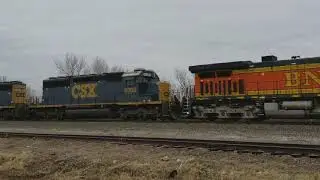BNSF with CSX and heavyweight flatcars