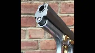 TAURUS Miami FL. PT 945 Cal. 45 ACP plata cachas de madera