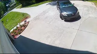 Surveillance video shows woman go into open garage, steal weed whacker