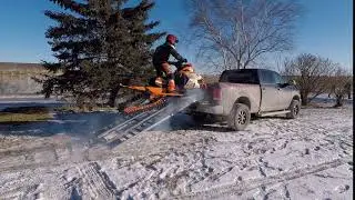 Loading Snowmobile