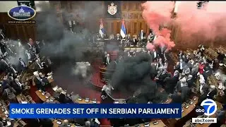 Smoke bombs, flares thrown in Serbian parliament; 3 lawmakers injured