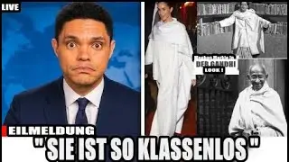 Trevor Noah dem&uuml;tigt Meghans Outfit auf der Pariser Modewoche im Live-TV auf urkomische Weise.