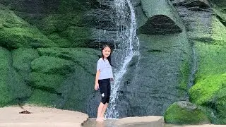 Water falls at Tresaith Beach South Wales.. freezing cold water shower challenge..