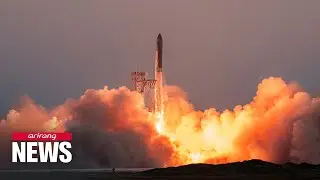 SpaceX catches returning Starship booster in fifth flight test