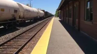 Norfolk Southern GP38 leads an outbound Manifest through Northbrook Metra station