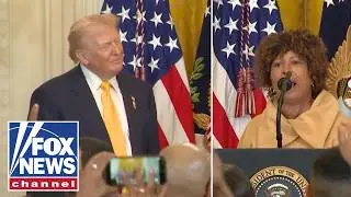 &lsquo;Let him do his job&rsquo;: Supporters defend Trump against racism accusations at Black History Month fest