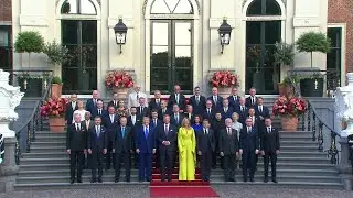 NATO leaders pose for group photo with Dutch Royal family | AFP