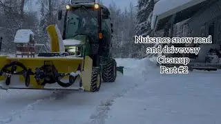 JD 1025R Driveway cleanup. 