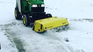 Broom does NOT work well on slushy wet snow.