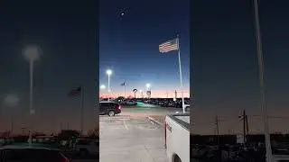American flag at sunset in hometown