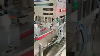 Inline cap tightening machine for lotion pump bottles