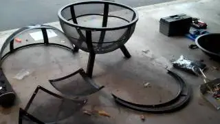 Landmanns Ball of Fire fire pit being Assembled in parts