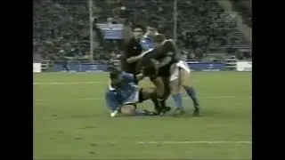Tana Umaga gets his hair pulled by Luca Martin