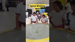 Spiral Wishing Well in a Science Exhibit.