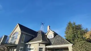 Drone roof treatment for moss and mold