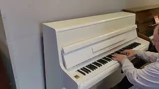 Used White Piano with a warranty