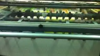 salida de papel en m&aacute;quina offset