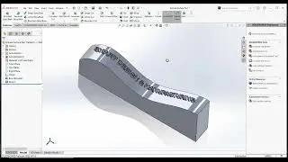 How to emboss a name or text on a curved surface in SolidWorks