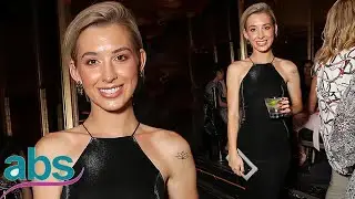 Alex Nation looks radiant and poses with pals at event