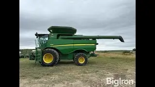 BigIron Auct HW8435 JD S680 4x4 Combine