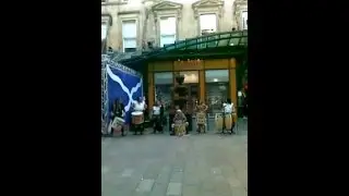 Glasgow Central, street performers, drummers and bagpipes, Buchanan Street/May 25, 2008