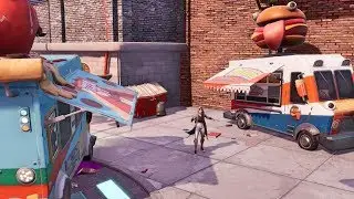 Dance or emote between two Food Trucks (Downtown Drop Challenges) - Fortnite Battle Royale