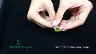 Anillo de plata con peridoto triangular