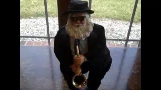 Rare Gemmy saxophone santa