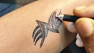 N letter design tattoo for men on hand at home by pen easy | Tattoo style