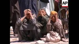 Aid trucks & refugees near the Afghan/Pak border