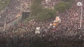 Chile protester seen disabling the riot police's water cannon