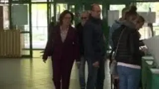 Candidate of Poland's opposition coalition votes