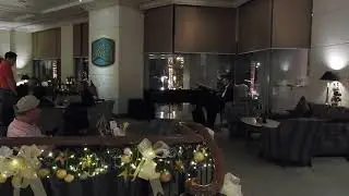 Piano Player Marco Polo Hotel